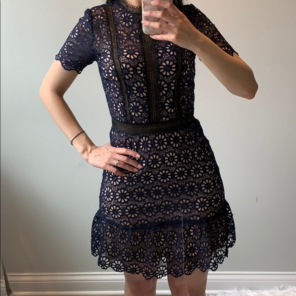 Nude with navy lace over lay mini dress